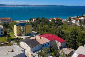 an aerial view of a town with the ocean at Hibis, No 1 in Starigrad