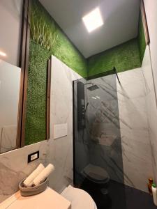 a bathroom with a shower and a toilet at LE TEMPLE DU LUXE in Agrigento +69 photos