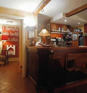 a kitchen with a counter with a lamp on it at Garnì B&B La Rua-Pescocostanzo in Pescocostanzo