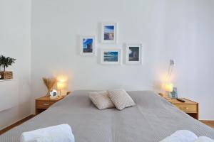 a bedroom with a bed with two pillows on it at Hibis, No 3 in Starigrad