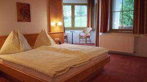 Posteľ alebo postele v izbe v ubytovaní Hotel-Pension Stallinger