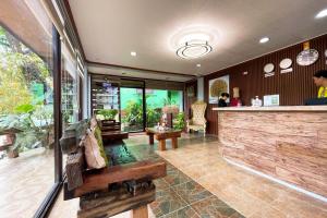 a lobby of a restaurant with a counter and a bar at Kamayan sa Palaisdaan Hotel and Resort Quezon in Lucban +155 photos