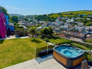 a hot tub on the roof of a house at High Cross House in Millbrook
