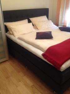 En eller flere senger på et rom på Ferienwohnung Huttenstrasse 22C