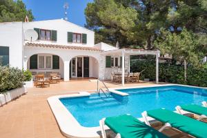 a villa with a swimming pool and a house at Villa Linda by 3VILLAS in Son Parc +32 photos