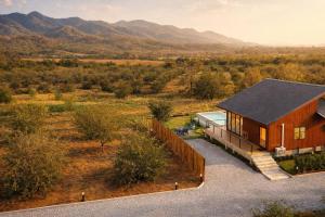 an overhead view of a house with a fence at Solitude Villas in Ban Chang Talut