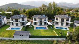 an aerial view of a house with a large yard at Holiday Villa Lena in Köyceğiz