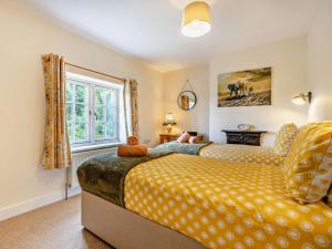 a bedroom with two beds and a window at 2 Bed in Alford oc-92252 in Rigsby
