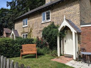 a wooden bench in front of a house at 2 Bed in Alford oc-92252 in Rigsby
