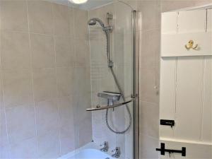 a bathroom with a shower with a toilet and a sink at 2 Bed in Alford oc-77637 in Rigsby +13 photos