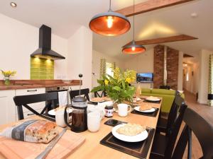a dining room with a table with food on it at 3 Bed in Alford oc-55963 in Rigsby