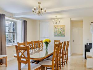 a dining room with a table and chairs at 6 Bed in Buxton oc-77369 in Longnor