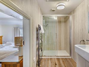 a bathroom with a shower and a sink at 6 Bed in Buxton oc-77369 in Longnor +25 photos