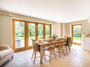 a dining room with a table and chairs at 4 Bed in Wrexham oc-87675 in Chirk