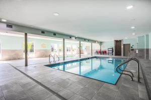 a large swimming pool in a building at Hampton Inn & Suites Edmonton St. Albert, Ab in Edmonton