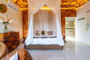 Llit o llits en una habitació de Cabañas Luxury - Adults Only