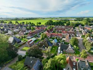 an aerial view of a residential suburb at B&B Suyder Cogge in Hem