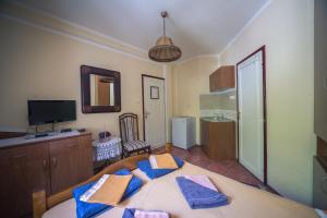 Ένα ή περισσότερα κρεβάτια σε δωμάτιο στο Apartments Villa Ferri