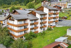an aerial view of a apartment building at Ambiente Appartement C2 - moderne Ferienwohnung mit Terrasse in Leukerbad in Leukerbad
