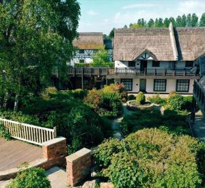 an aerial view of a house with a wooden deck at Owd Nell's Tavern in Garstang