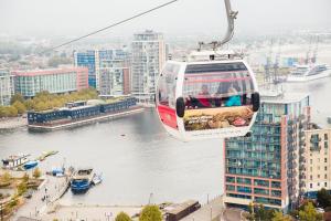 a gondola ride over a river in a city at Good Hotel London in London