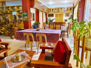 a dining room with a table and chairs at Best Sagada Lodge within City Proper! in Sagada +17 photos