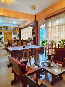 a dining room with a table and chairs at Best Sagada Lodge within City Proper! in Sagada