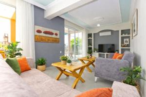 a living room with a couch and a table at Patara Evleri in Patara
