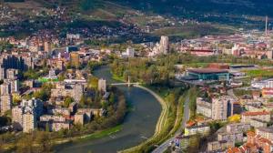an aerial view of a city with a river at Hidden Home in Zenica