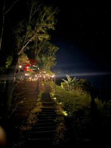 a stairway at night with lights on it at Glamping Villa JuanMa in Salónica