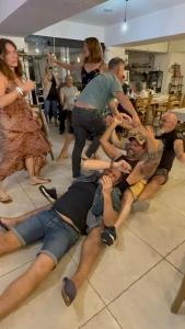 a group of people laying on the floor at Hotel Carina-Très Grande Piscine-Local à Vélo in Apt