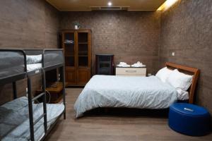 a bedroom with two bunk beds in a room at Le Dimore di Mariuccia 1 in Monte SantʼAngelo