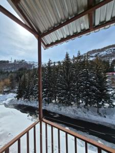 a view from a porch in the snow at Apartment in Jermuk in Jermuk