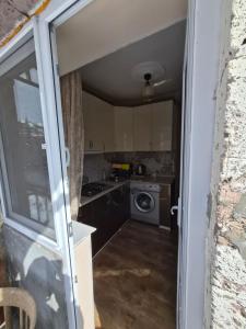 a kitchen with a washer and dryer in it at Apartment in Jermuk in Jermuk