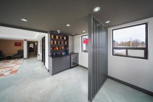 a hallway of a building with a large window at Ramada by Wyndham Kingston in Kingston