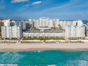 an aerial view of a resort on the beach at Hilton Cancun Mar Caribe All-Inclusive Resort in Cancún