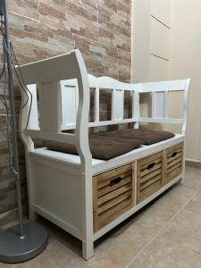 a white bunk bed in a room at Guest house Kozle in Skopje