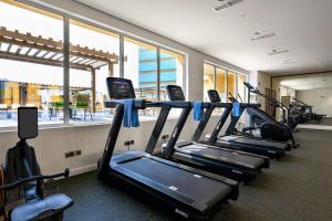 a row of cardio machines in a gym at DoubleTree by Hilton Jeddah - Alandalus Mall in Jeddah