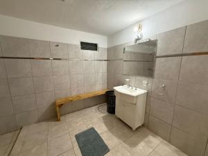 a bathroom with a sink and a mirror at Refugio del Alma in Villa Anizacate +34 photos