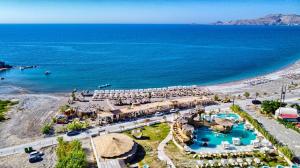 an aerial view of a resort and the ocean at Alia Beachfront Suites and Spa in Haraki