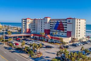 an aerial view of a hotel with a parking lot at The Ocean Calls Harbour Beach 612 in Daytona Beach