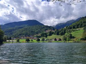 a view of a river with mountains in the background at Casa Nonna Adelaide in Roncone