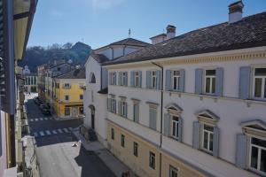 a view of a city street with buildings at TORTORELLA Apartments in Gorizia