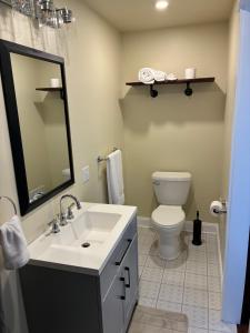a bathroom with a sink and a toilet at Alden Villa in Lebanon
