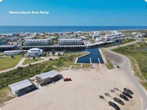 an aerial view of a beach with a harbor at Simply Adventurous in Mexico Beach