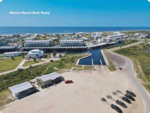 an aerial view of a beach with a harbor at Simply Adventurous Too in Mexico Beach