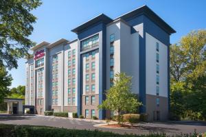 an image of a building at Hampton Inn & Suites Charlotte Arrowood Rd in Charlotte