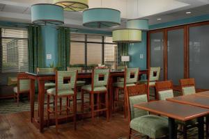 a dining room with a long table and chairs at Hampton Inn Bermuda Run / Advance in Bermuda Run