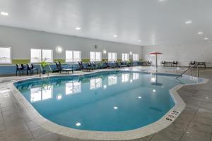 a large swimming pool in a hotel room at Hampton Inn & Suites Edmonton/West in Edmonton
