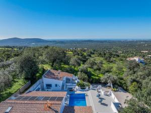 an aerial view of a house with a swimming pool at Vista Azul by Vintage Travel in Loulé